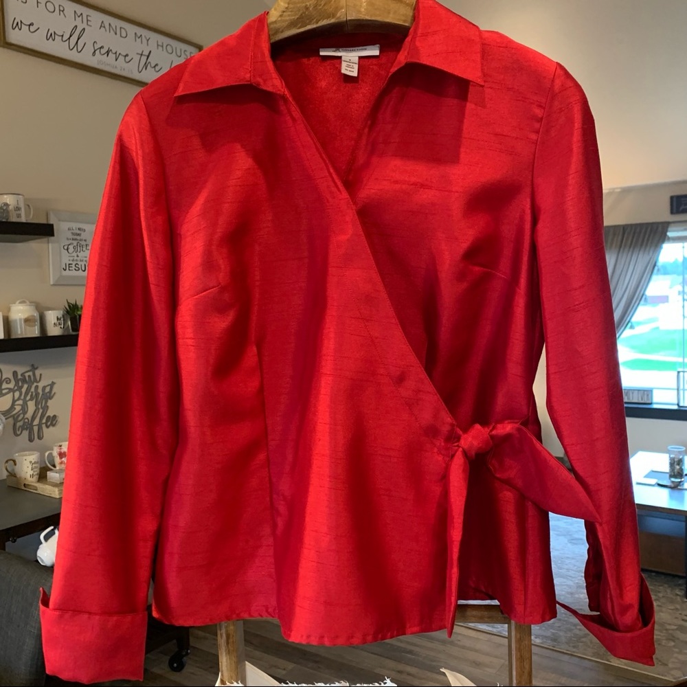 Red satin looking blouse size 8 long sleeved 100% polyester